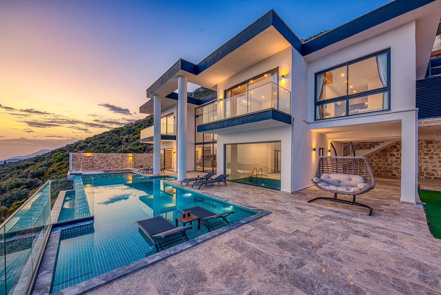 A modern rental property at dusk
